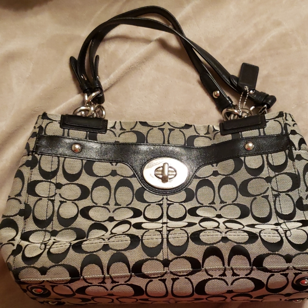 Coach hobo purse with leather straps and trim